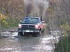 Lets see pics of your 1st gens in the mud or snow or both.-twinmudstacks.jpg