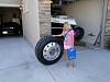 Finally got my wheels and tires-tire-w-daughter.jpg
