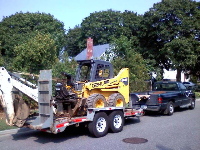 Name:  backhoeontrailer.jpg
Views: 72
Size:  67.3 KB
